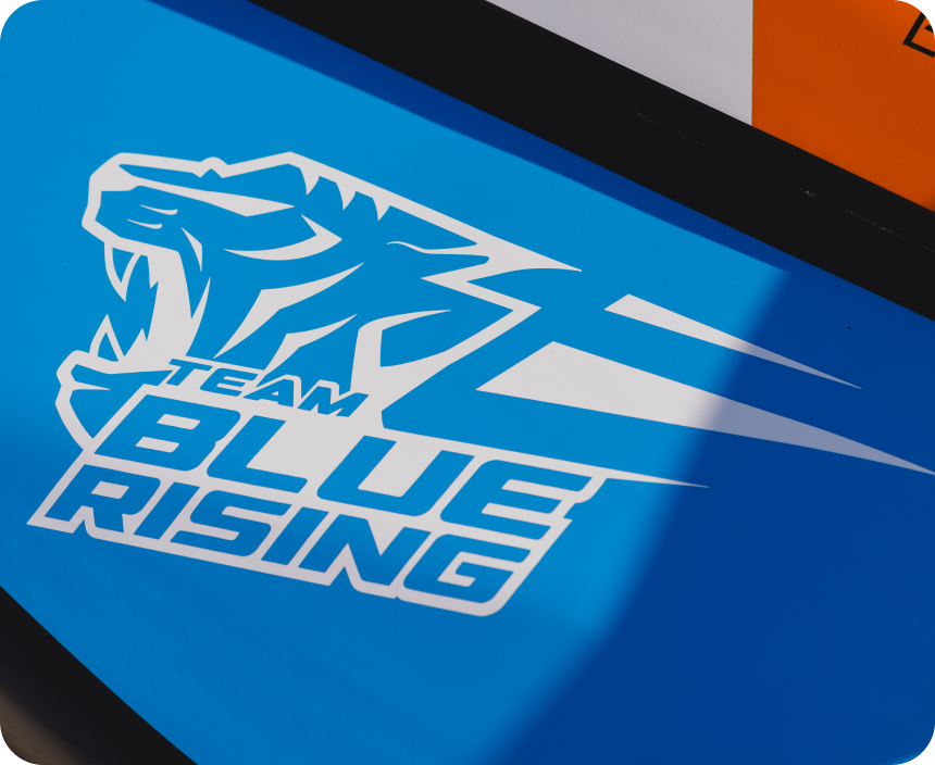 blue-rising-logo-on-boat-wt